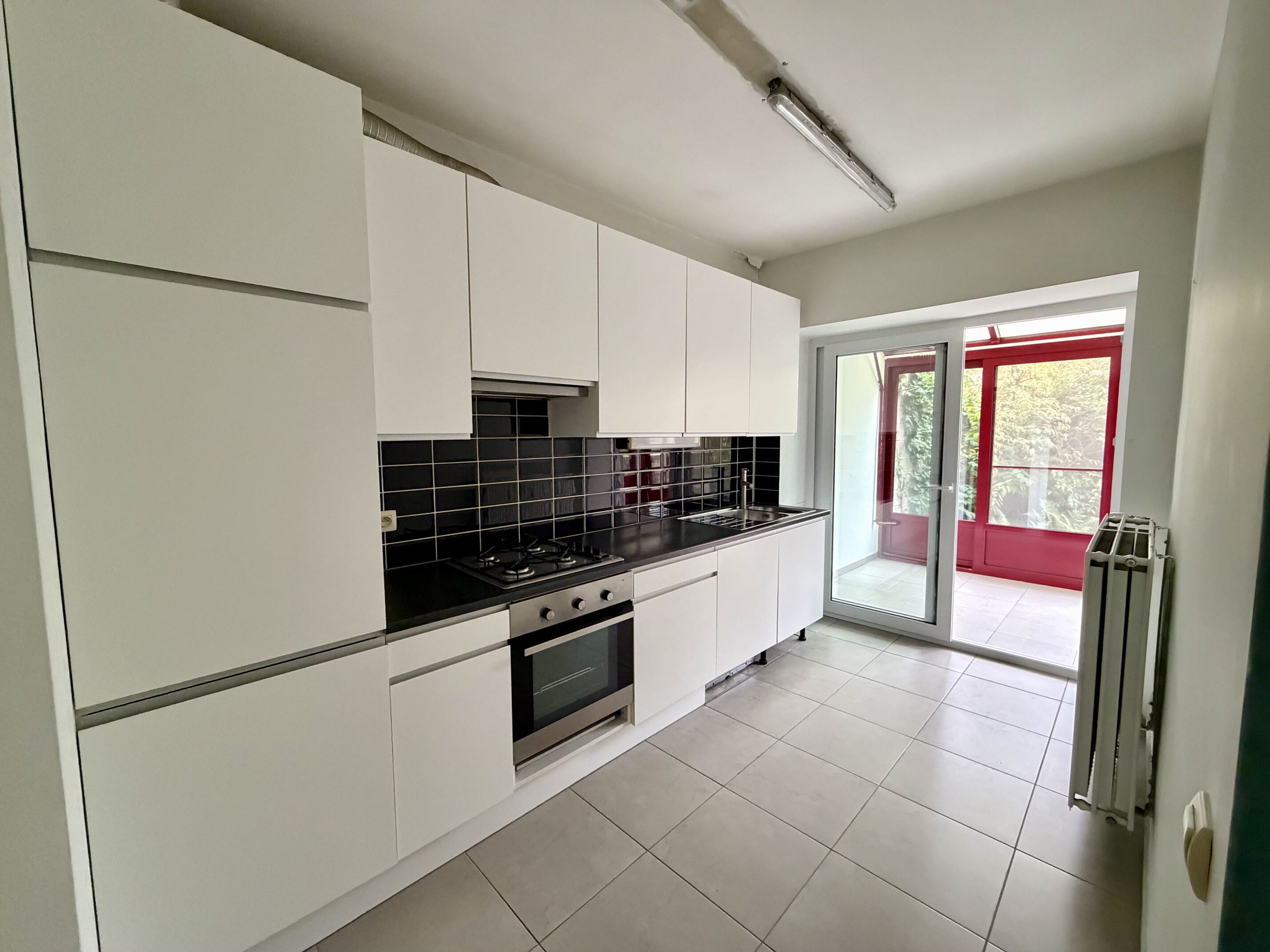 Gelijkvloers appartement met garage & stadstuin
