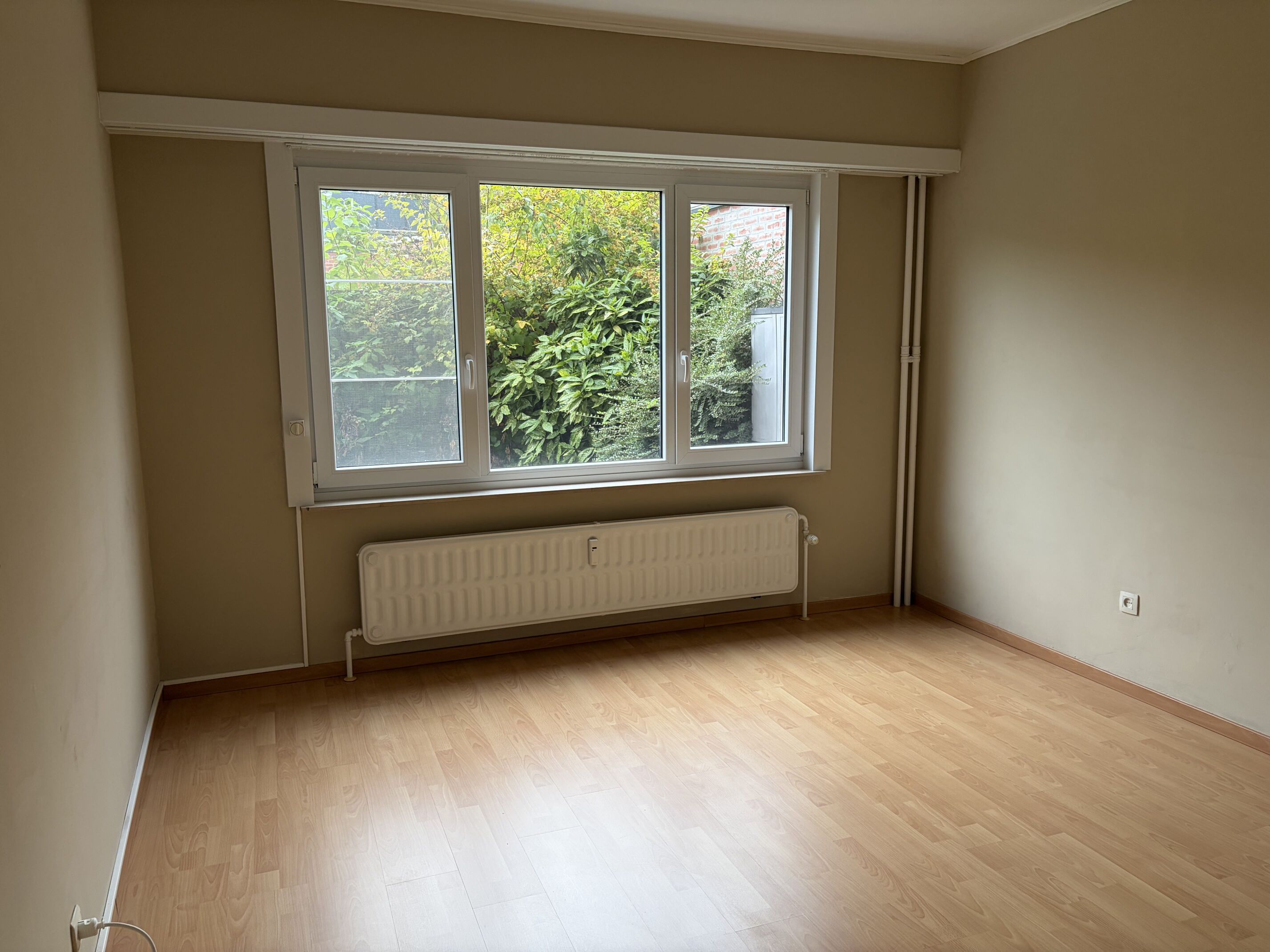 Gelijkvloers appartement met garage & stadstuin