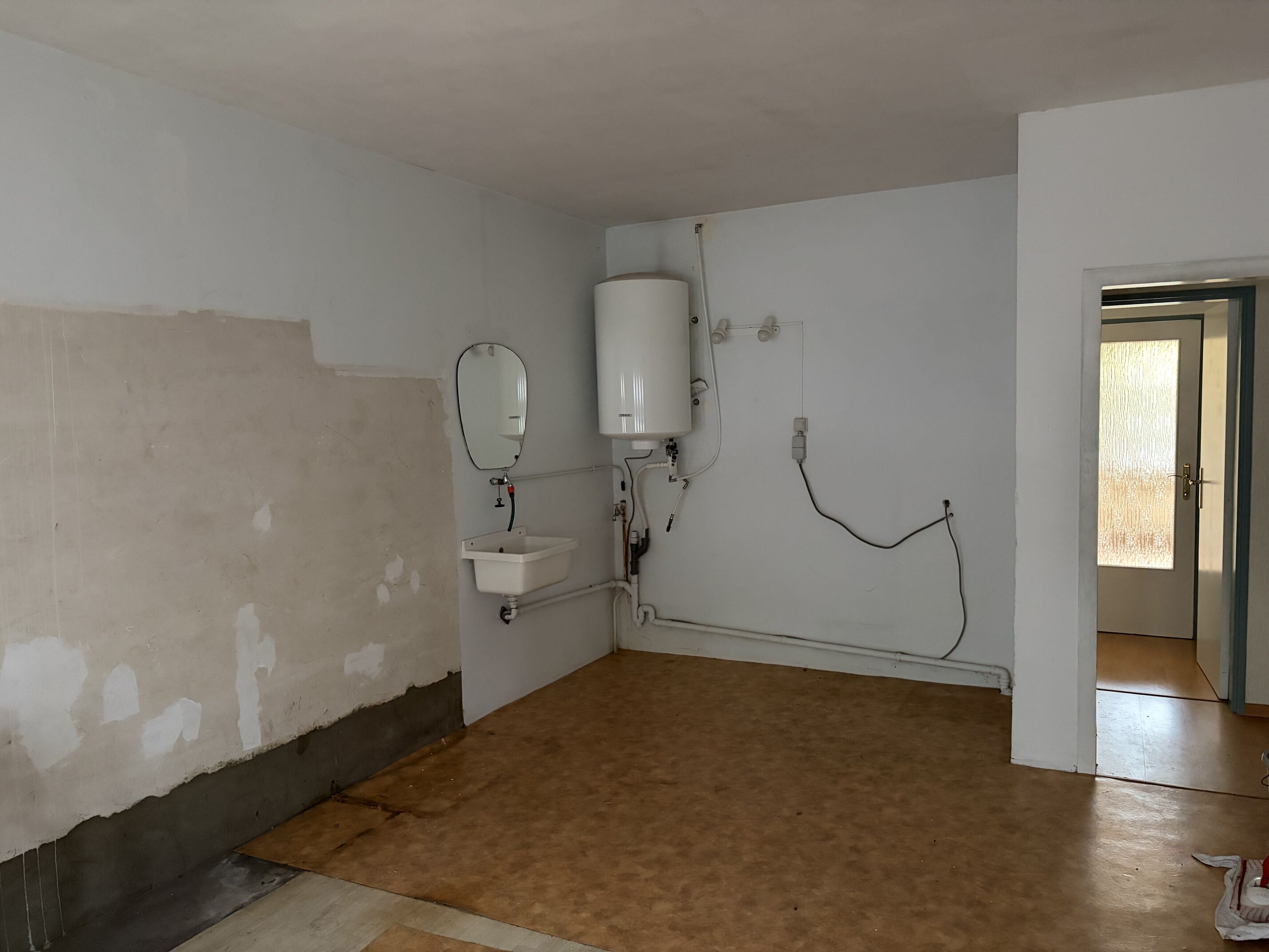 Gelijkvloers appartement met garage & stadstuin