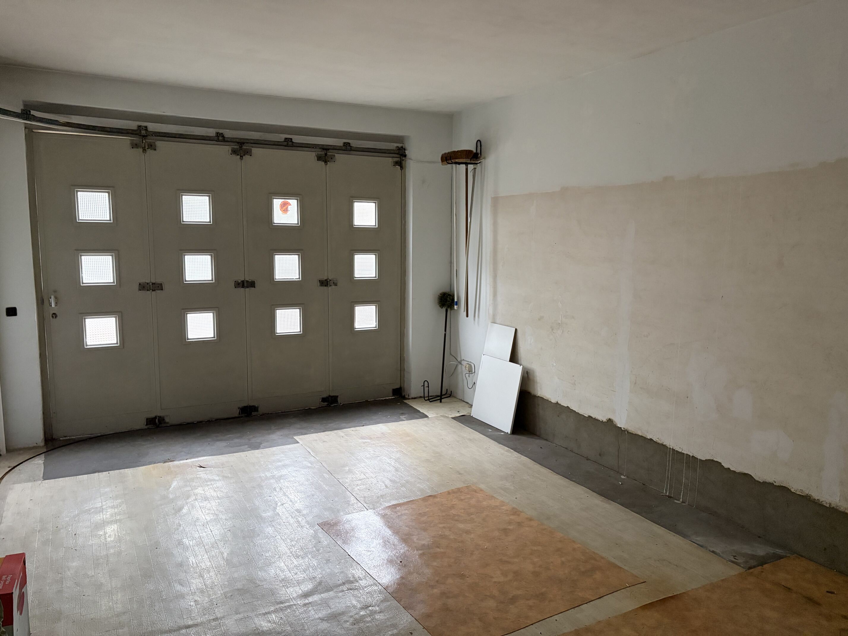 Gelijkvloers appartement met garage & stadstuin