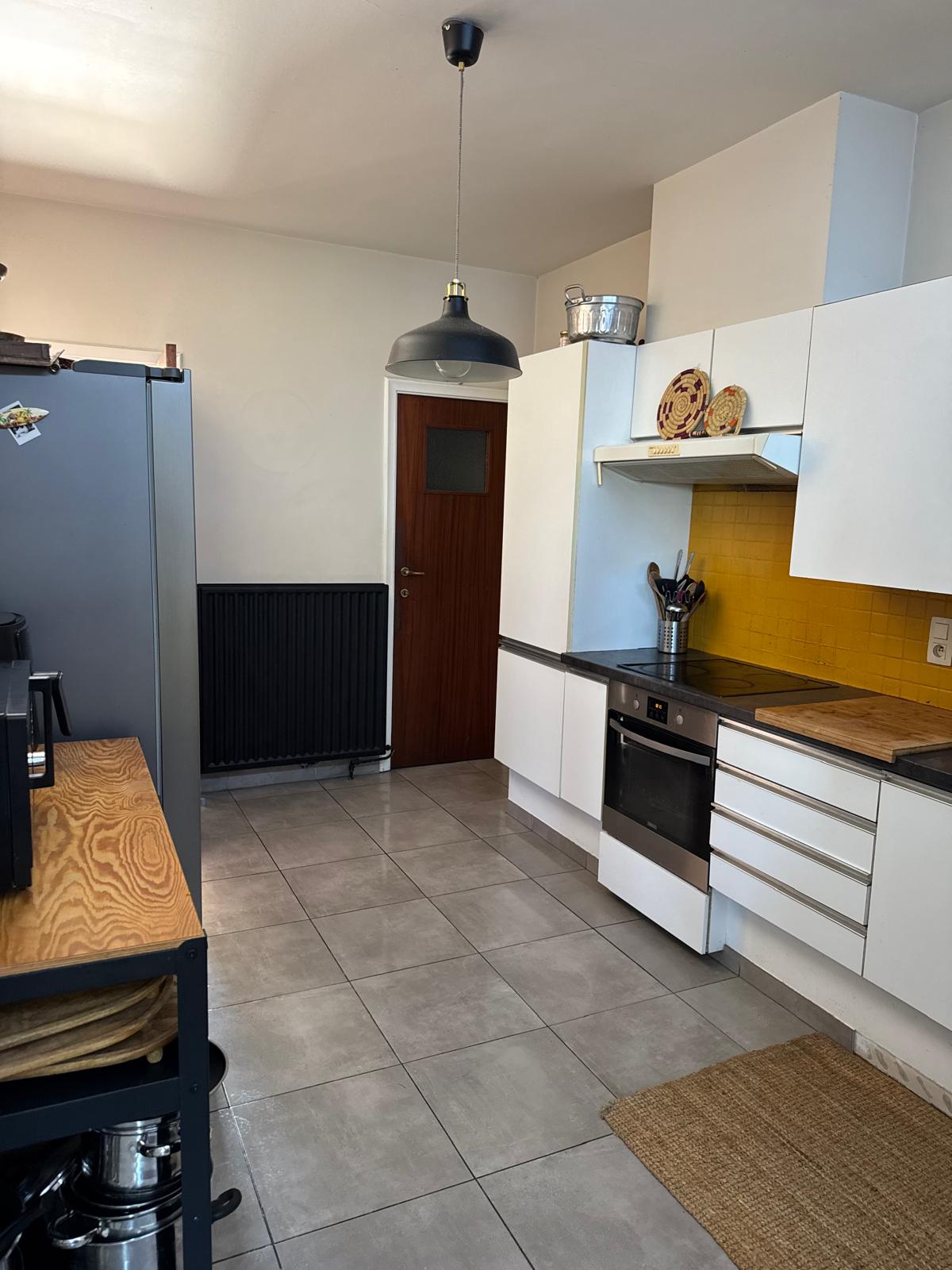 Halfopen woning met 3 slpk., garage & diepe tuin Mechelen